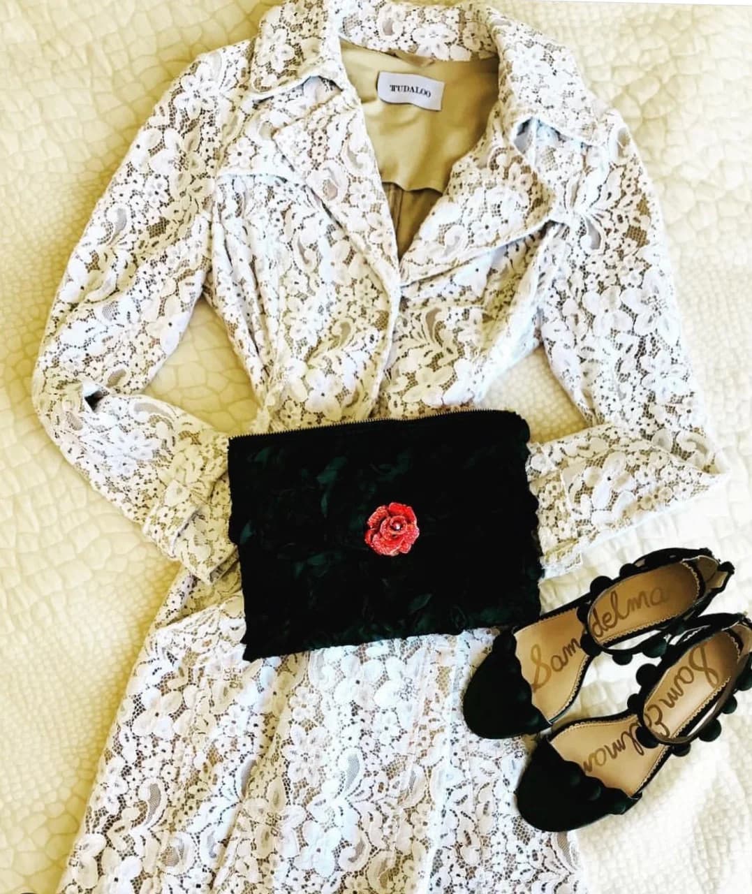Tudaloo hand clutch with rose brooch